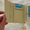 Cheese and cheese short small wallet for girls 2023 New style student cute cartoon large-capacity card bag three-fold wallet Specification image
